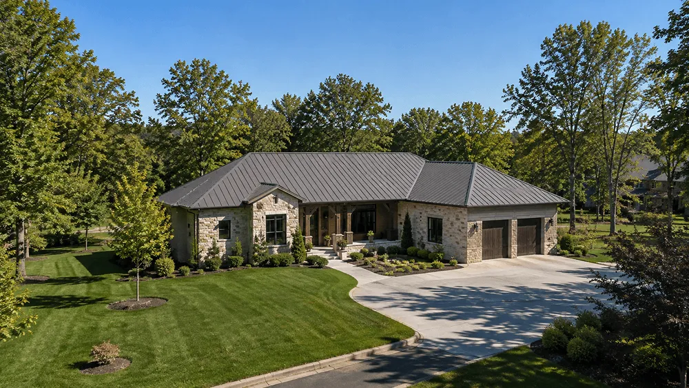 Premium Leawood home with standing seam metal roofing installed after a storm upgrade